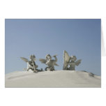 Angel figurines with musical instruments on greeting cards