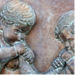 Angels blowing trumpets copper aged relief photo sculptures