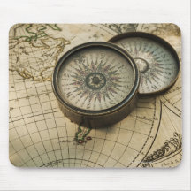 Antique compass on map mousemats