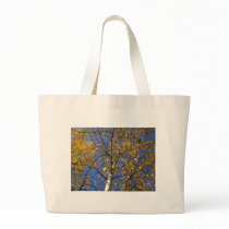 Aspen tree looking up through yellow leaves. canvas bag