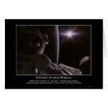 Astronaut Joseph R. Tanner  backdropped against Ea Card