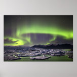 Aurora over a glacial lagoon posters