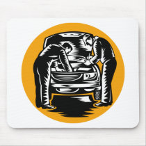 Automotive mechanic working on car repair retro mouse pad