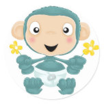 baby chimp with flowers round sticker