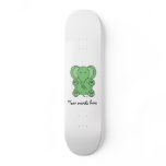 Baby green elephant skateboards