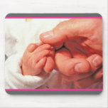 baby in dads hands