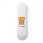 Baby orange elephant skateboards