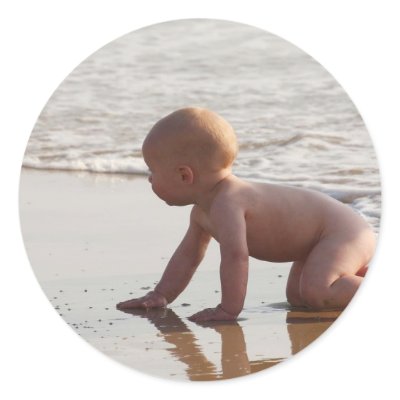 Baby playing in the sand on the beach sticker by beverlytazangel