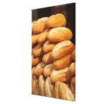 Baguette, bread, for sale in street by hawker. stretched canvas prints
