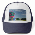 Balloons inflating at xlta event mesh hat