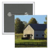 Barn on thoroughbred horse farm at sunrise, pins