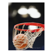 Basketball in basket. post card