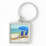 Beach, Umbrella and Chairs at the Shore