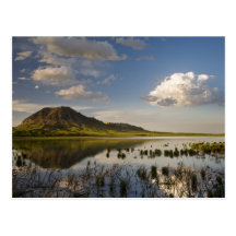 Bear Butte reflects into Bear Butte Lake near Postcard