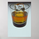 Beautiful glass filled with Scotch and ice cube Poster