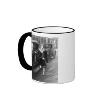 Beautiful woman and cars, 1920s coffee mug