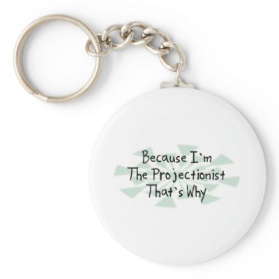 Because I'm the Projectionist Key Chains by busybrain