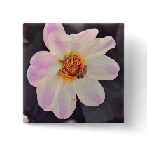 Bee on a purple flower button