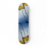 Beer poured into glass skateboard deck