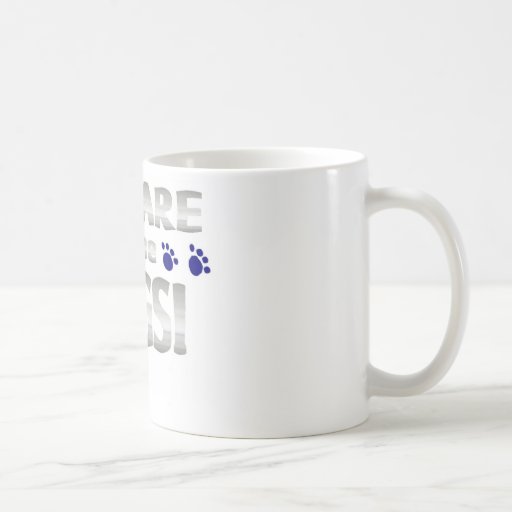 Beware of the dogs! with blue paw prints coffee mug