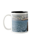 Bicycle at waterfront with Yantai city skyline, Mugs