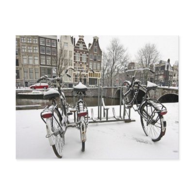 Bikes in snowy Amsterdam in the Netherlands Postcards by HollandProducts
