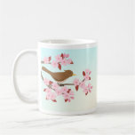 Bird sitting in a cherry blossom tree mug