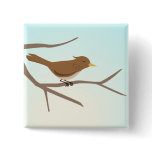 Bird sitting on branches of a tree button