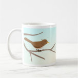 Bird sitting on branches of a tree mug