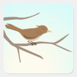 Bird sitting on branches of a tree sticker set