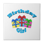 Birthday girl in blue with presents tiles