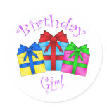 Birthday girl in purple with presents round sticker