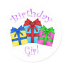 Birthday girl in purple with presents round sticker