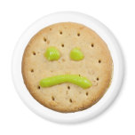 Biscuit with sad face magnets
