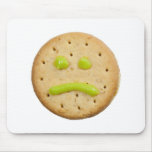 Biscuit with sad face mousepads