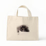 Black and white cat big yellow eyes looking right tote bag