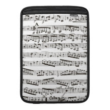 Black and white musical notes MacBook sleeves