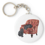 Black Cat and Scottish Terrier in a Red Chair keychains
