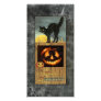 Black cat on a wooden fence with pumpkin picture card