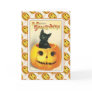 Black cat sitting in a pumpkin - halloween design greeting card