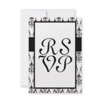 black chandelier on white modern damask invites