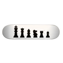 Black chess pieces on white skate boards
