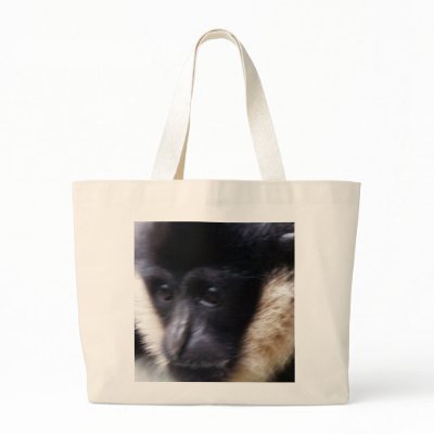 Black Gibbon Ape Face Closeup Pastel Canvas Bags by angela65