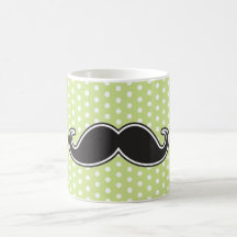 Black handlebar moustache on lime green polka dots coffee mug