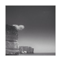 Black & White Sea Against Rocks Portugal Stretched Canvas Print