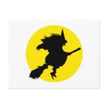 Black witch silhouette against golden full moon post card