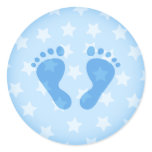 Blue baby footprints on a starry background