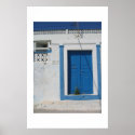 Blue door in Santorini posters