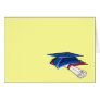 Blue graduation hat with a scroll and a red band