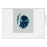 Blue inverted face with hand over mouth card